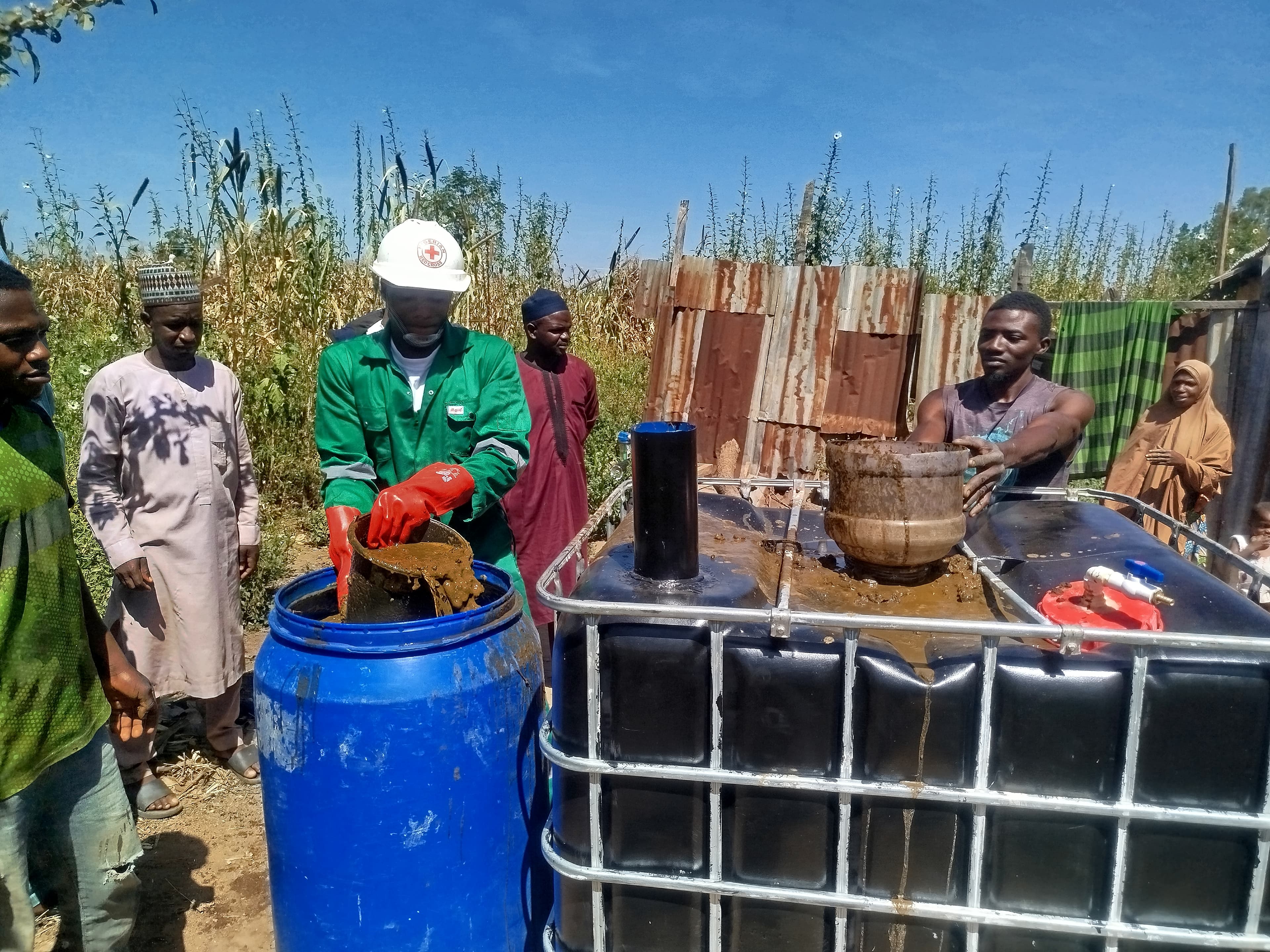 Community members operating a Biospark gas hub
